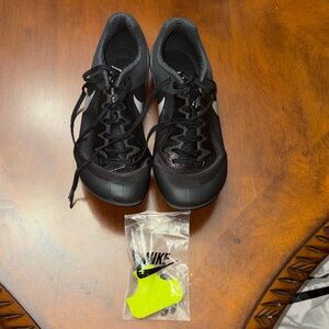 Nike Black Running Shoes with White Swoosh and Neon Yellow Accessory